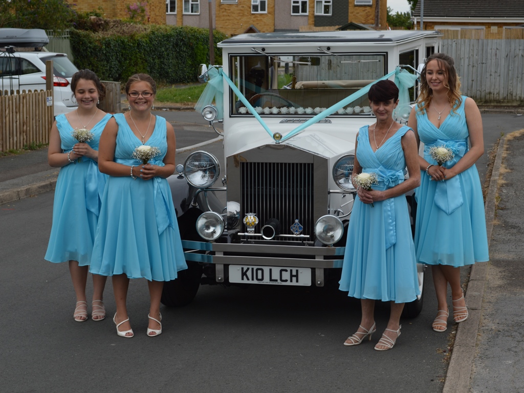 Tracy's bridesmaids with the Imperial wedding car