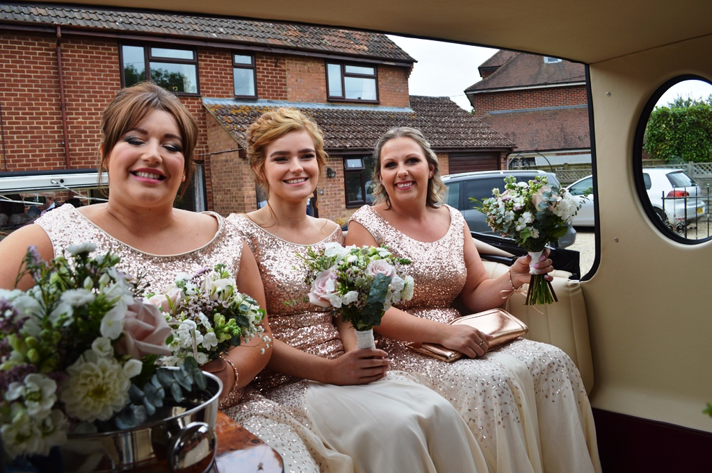 Jessica's bridesmaids in Imperial wedding car