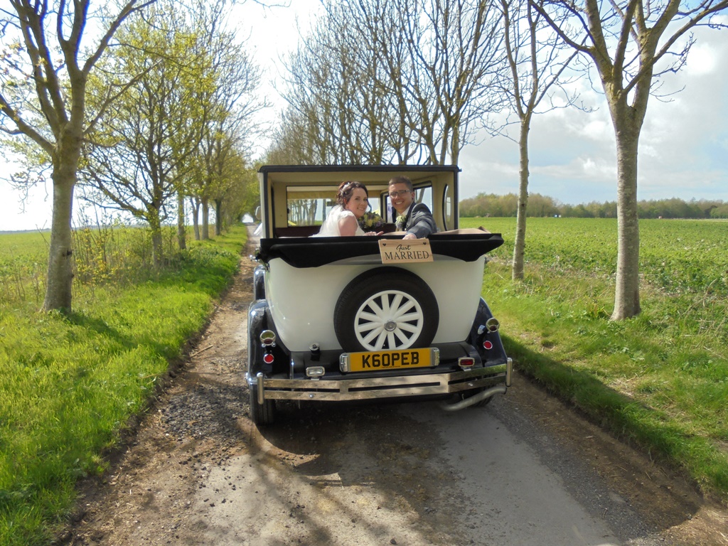 Amy & Dafydd in Imperial wedding car