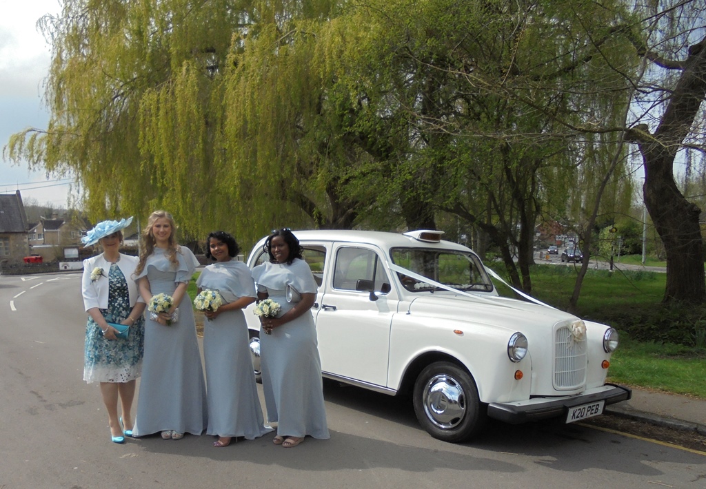 Bridal party with Fairway wedding car