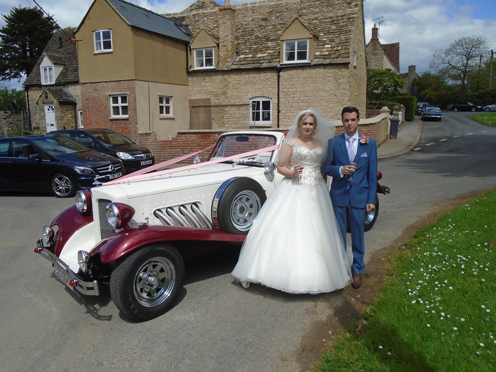 Hannah & Philip with Beauford wedding car