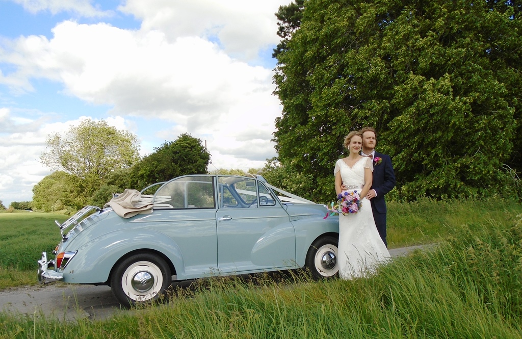 Laura & Jack with Morris Minor wedding car