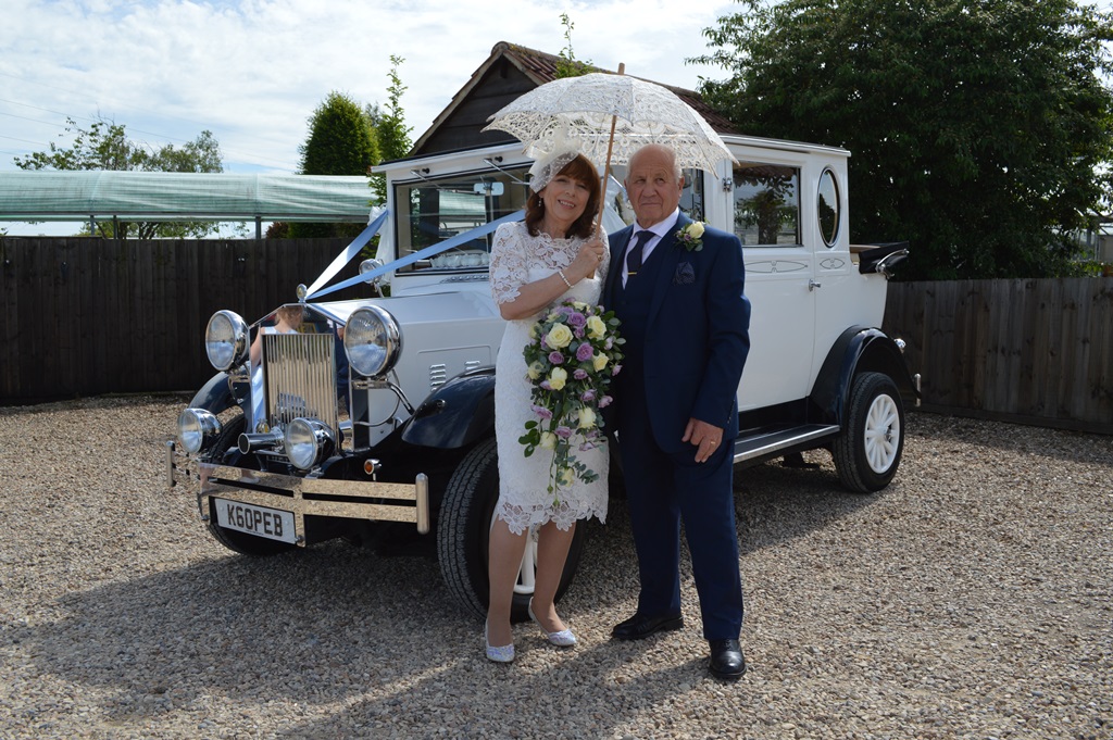 Pauline & Bob with Imperial wedding car