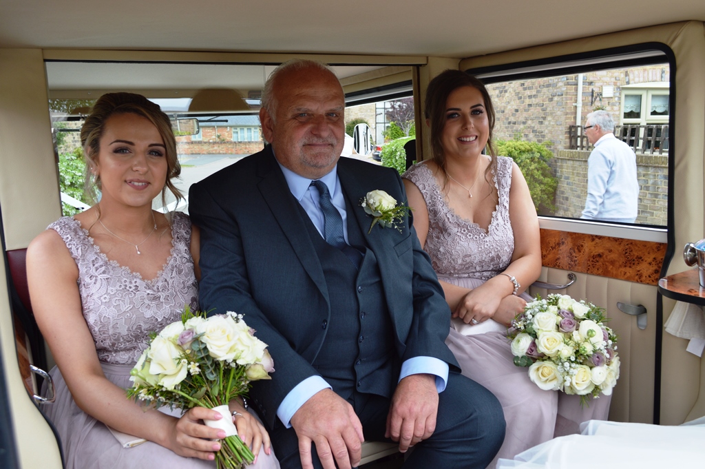 Sophie's bridal party in Imperial wedding car