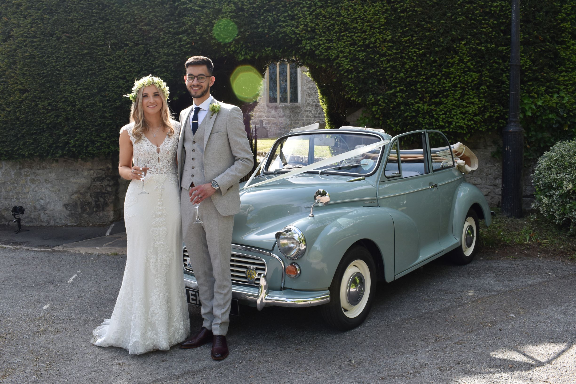 Yasmin & Scott with Morris Minor after they were married