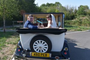 Holly and Luke in Imperial wedding car
